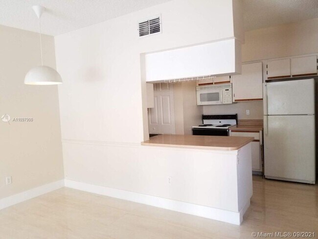 Building Photo - 18352 NW 68th Ave