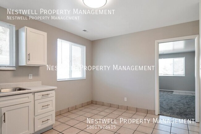 Building Photo - FREE 1ST MONTH'S RENT - Remodeled 2-bed Un...