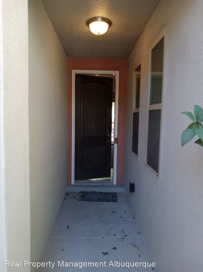 Building Photo - 3 br, 3 bath House - 6909 Papaya St NE