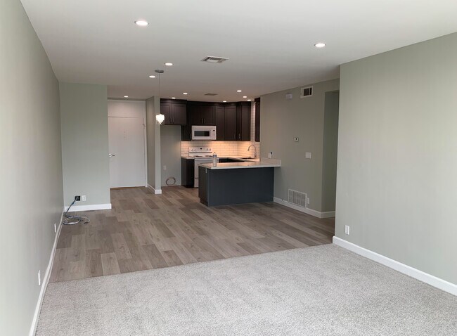 Cocina y sala de estar - The Wetherly Townhouse