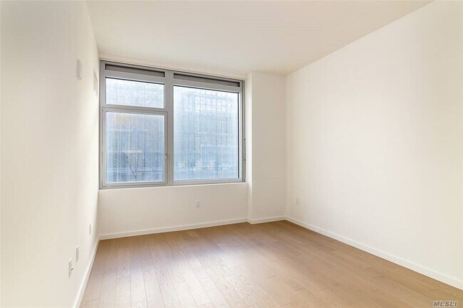 Building Photo - 133-27 39th Ave