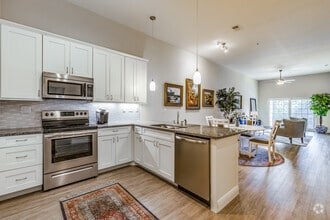 2 BR, 2 BA - 1,470-1,573 SF - Cotee - Stonehaven at Main Street