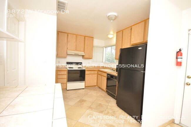 Building Photo - 8872 W Meadow Dr