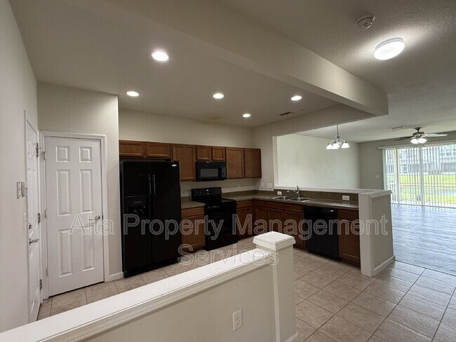 Foto del edificio - 6881 Woody Vine Dr