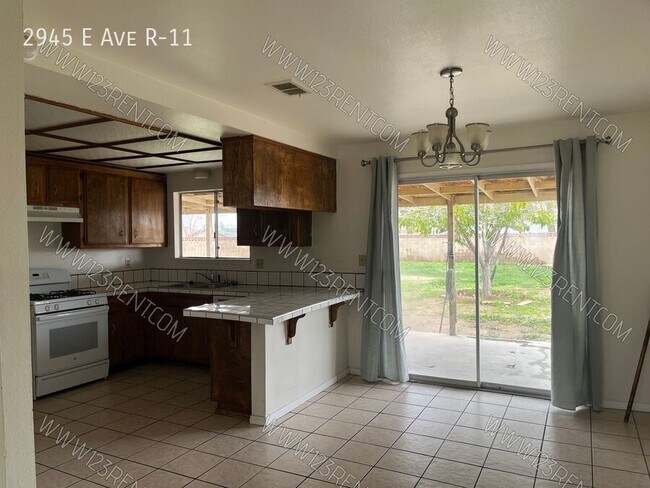 Building Photo - 2945 E Ave R-11