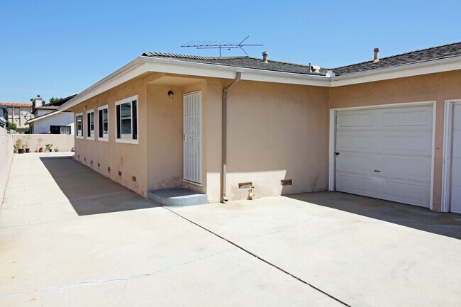 Outside + Garage - 4215 W 130th St