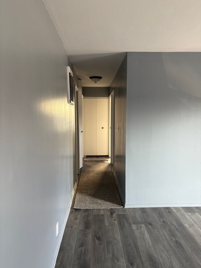 Building Photo - three bedroom one bath home with attached garage for rent