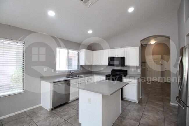 Building Photo - 14867 W Acapulco Ln