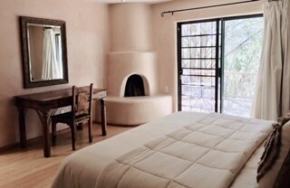 Master Bedroom with Gas Kiva Fireplace. - 330 Calle Estado