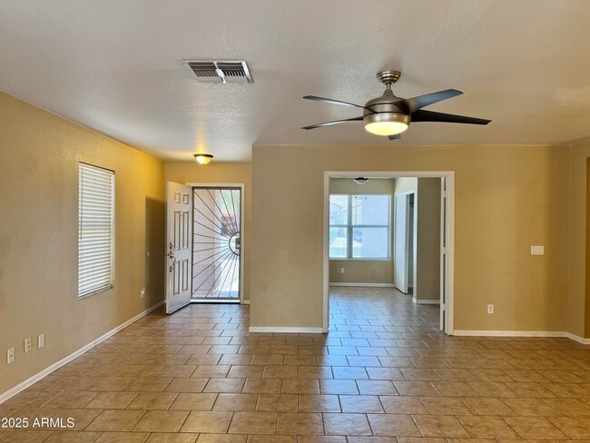 Building Photo - 15672 W Port Au Prince Ln