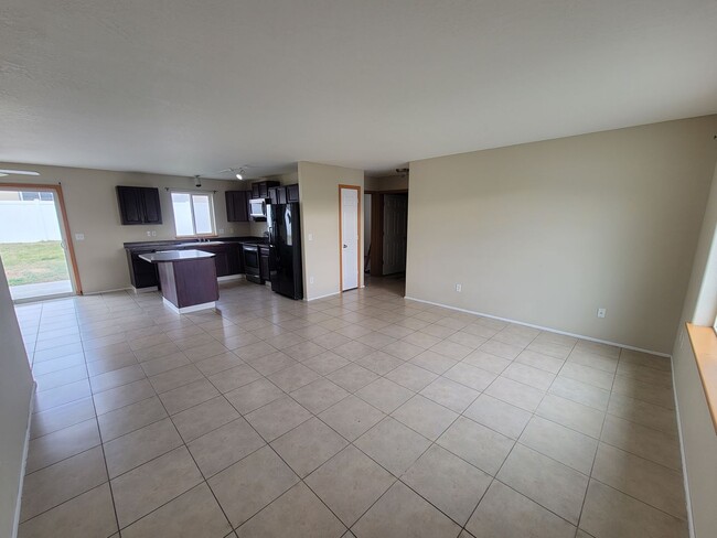 Building Photo - Comfortable 4-Bedroom Home with Fenced Bac...