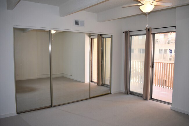 Master Bedroom with Large Closet and Balcony - 8060 E Girard Ave