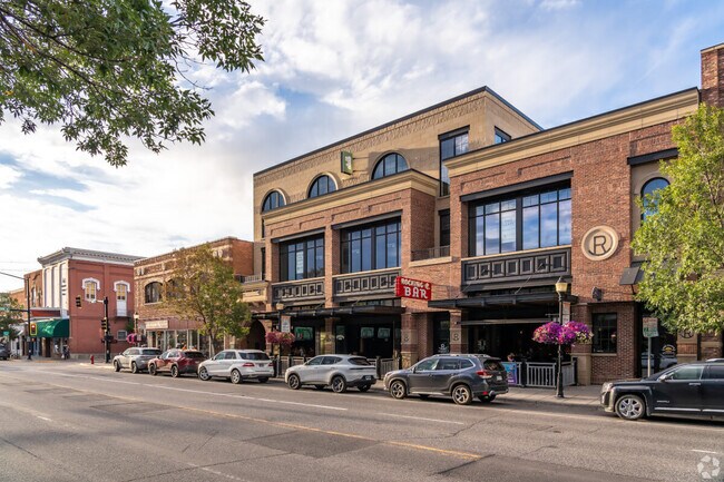 Cars line a historic street in Bozeman.