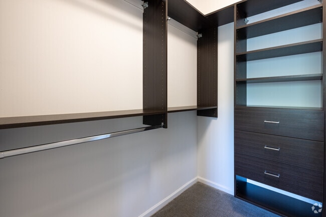 2BR, 1BA - 1,045SF - Model - Primary Bedroom Closet - The Majestic Luxury Apartments