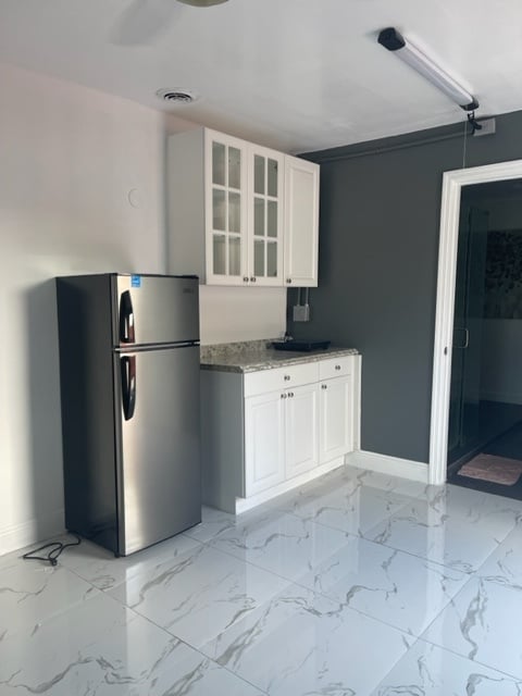 With cooktop on top of the kitchen counter - 9555 Independence Rd