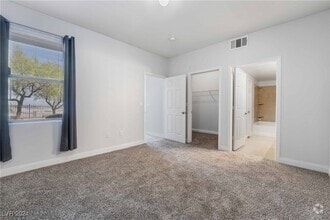 Building Photo - 8000 W Badura Ave