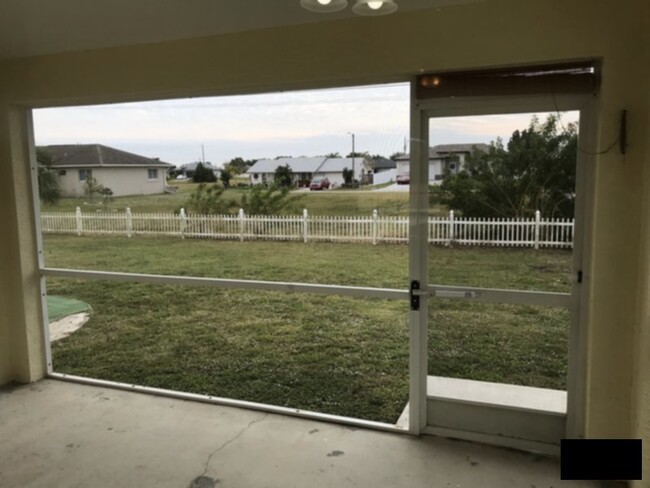 Triple Lot, 3 Car Garage, Fenced Yard! photo'