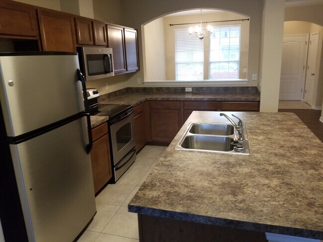 Foto del edificio - 4220 Plantation Oaks Blvd