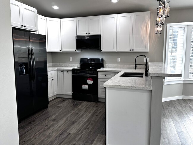 Foto del edificio - 207 S Razor Clam Dr SW