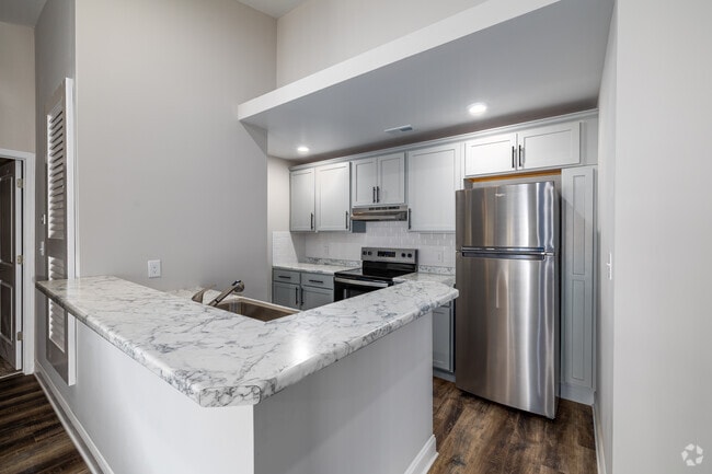 E2 2BR, 2BA - 1,120 SF - Kitchen - Spring Meadow Apartments