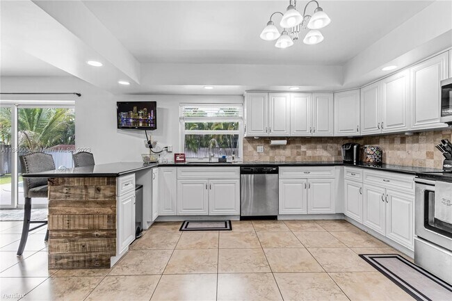 Foto del edificio - 3 br, 2 bath House - 131 SW 63rd Ave