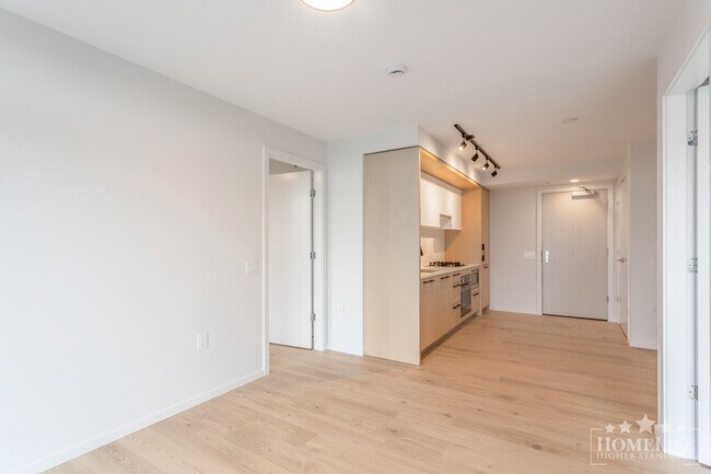 Building Photo - Brand New 2 Bed + Den Condo at FRAME in Norquay Village