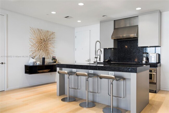 Building Photo - 9705 Collins Ave