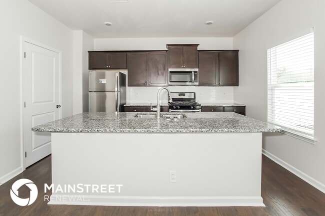 Building Photo - 5518 English Holly Wy