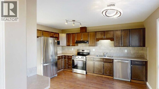 Photo du bâtiment - 11218-11269 69 Ave