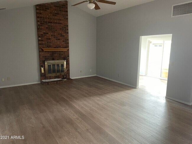 Building Photo - 6531 W Aire Libre Ave