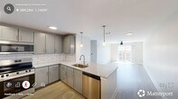 Located at 5440 Atlantic Springs Rd in Raleigh, NC, this single-floor, 3-bedroom, 1-bathroom home offers a well-designed layout with contemporary finishes throughout. The open-concept kitchen and living area serves as the heart of the home, featuring gray shaker-style cabinetry, white subway tile backsplash, granite countertops, stainless steel appliances including a range, microwave, dishwasher, and refrigerator, and a peninsula with pendant lighting overhead. Light wood-style flooring runs throughout the main living areas, complementing the neutral color palette and recessed lighting.

The living room is bright and airy, with a ceiling fan and sliding glass door that opens to a private balcony with outdoor views. Each of the three bedrooms is carpeted and equipped with a ceiling fan; the bedrooms feature generous windows that allow ample natural light and views of surrounding greenery. The primary bedroom includes direct access to a closet and an adjacent bathroom.

The bathroom is finished with gray cabinetry, granite countertops, a large mirror with overhead lighting, and wood-style flooring, maintaining a cohesive aesthetic with the rest of the home.