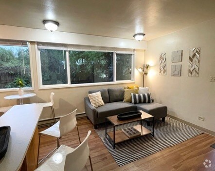 *Note* Flooring or coloring may vary slightly as the photo is of an identical downstairs unit. - 2176 W 15th Ct