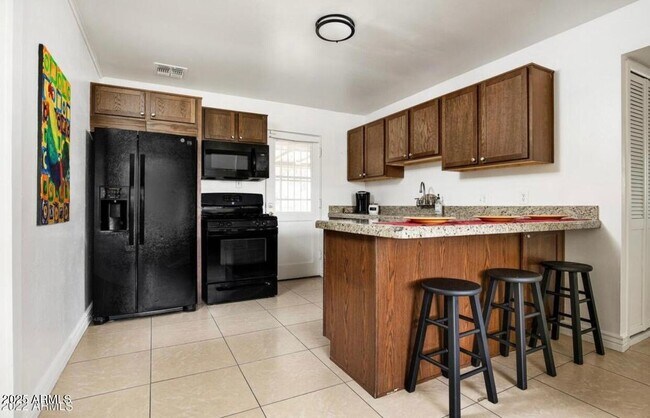 Foto del edificio - 3914 E Cheery Lynn Rd