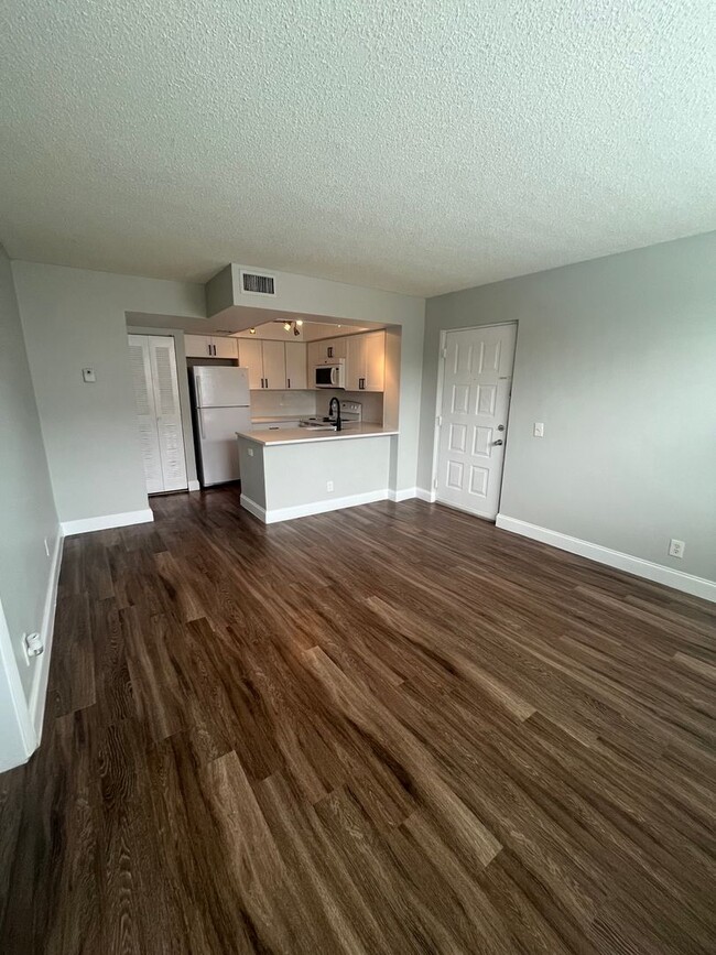 Building Photo - One Bedroom One Bathroom! WATERFRONT COMMU...