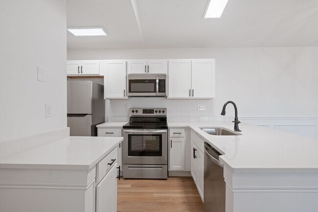 Foto del interior - https://www.estatesofcamelotcourt.com/