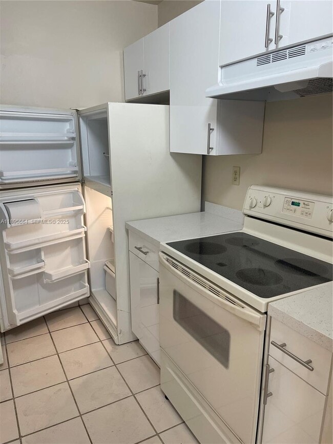 Building Photo - 10818 Royal Palm Blvd