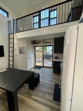 Living area with ladder to loft - 513 Second St