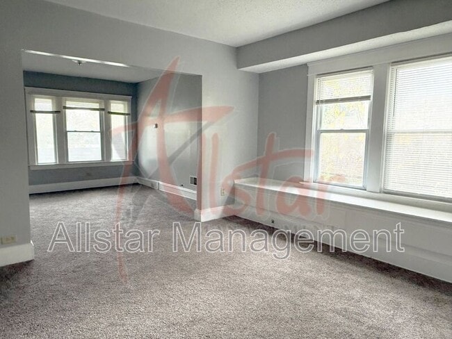 Foto del edificio - 3018 E 125th St