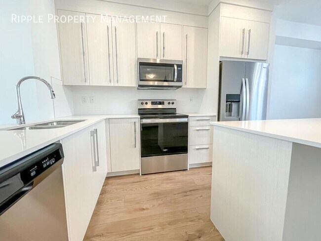 Photo du bâtiment - AMAZING MODERN 3 BEDS+DEN/ 2.5 BATHS TOWNHOUSE