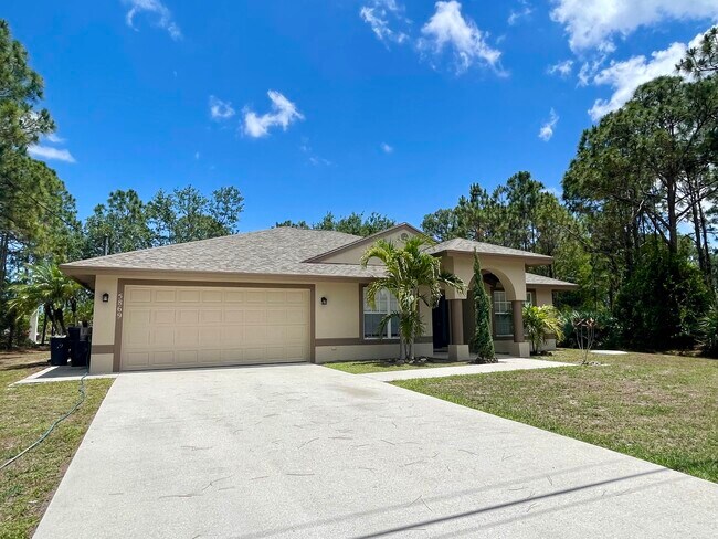Building Photo - 5869 NW Carovel Ave