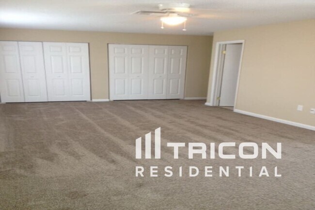 Building Photo - 7252 Riverbank Dr