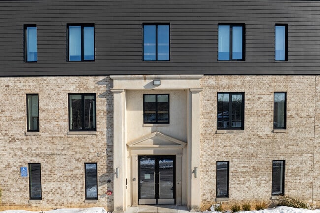 Building Photo - The Flats on 100