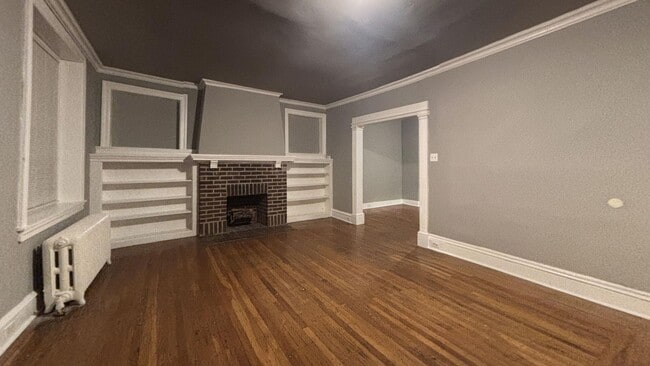 Building Photo - Nice Home with Hardwood Floors