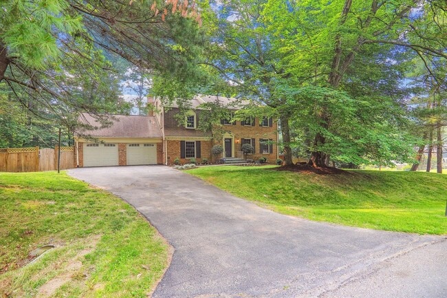 Photo - 5 BR 4.5 BA home with inground heated pool and extensive hardscape!