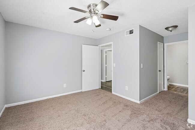 2BR, 2BA - 1,070SF - Primary Bedroom - Brook Hill Village Apartments