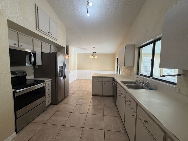 Building Photo - Spacious Open-Concept Home with Bonus Patio & Fenced Yard