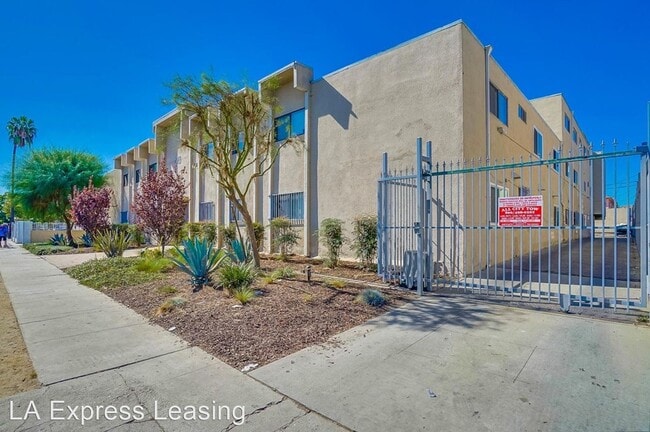Building Photo - 6113 8th Ave
