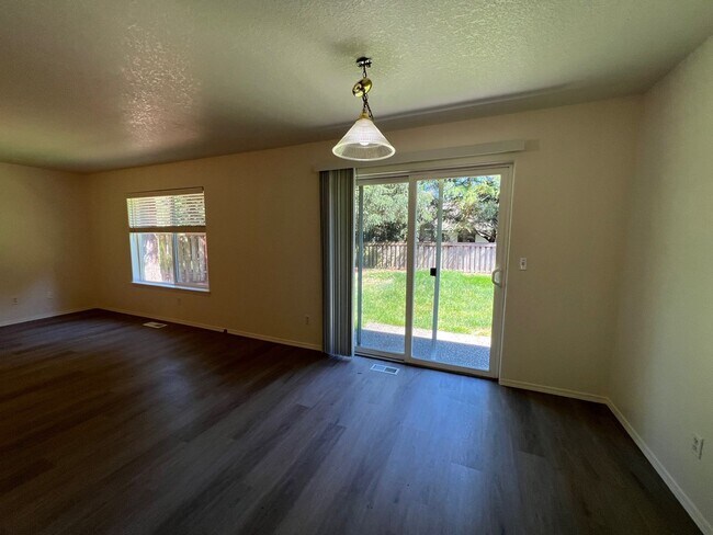 Building Photo - 8573 NE Hodes Street ~ Beautifully Refresh...