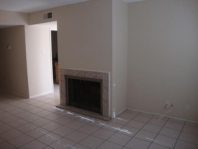 Living room with wood burning fireplace - 1644 Lomaland Dr
