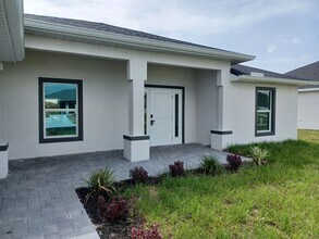 Building Photo - $1000 OFF THE FIRST MONTHS RENT: Available Now!! Brand New Construction 4/3